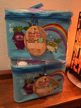 Set of 2 UglyDolls Travel Tote Sets with purple loofahs